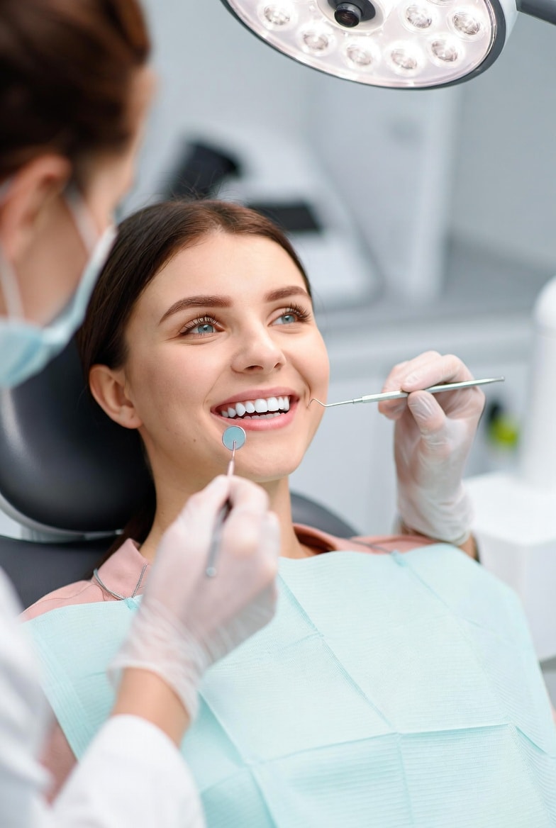 Dentist reviewing X-ray with patient — Oral Surgery at Carrollwood Smiles, Tampa FL