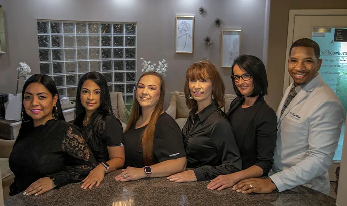 Dr. Storm Briggs and the Carrollwood Smiles team in Tampa, FL